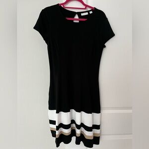 NY&Co Black Stretch Dress with cream and white stripe detail

Length is 38”